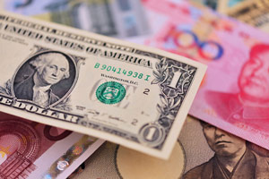 How the devaluing Chinese Yuan Will Spark a U.S. Economic Collapse