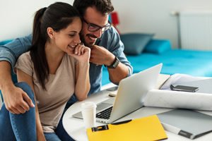 couple looking at stocks