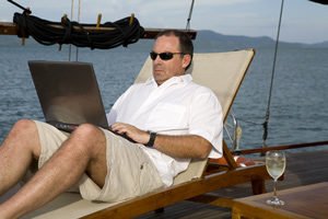 man holding laptop