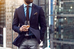 businessman with suit and glass of wine