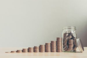 row of joins in front of coin jar