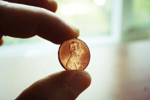 holding_penny_featured-300x200.jpg